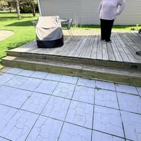 Weathered wooden deck before replacement
