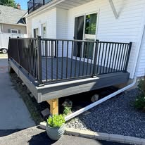 New dark composite deck with black railings